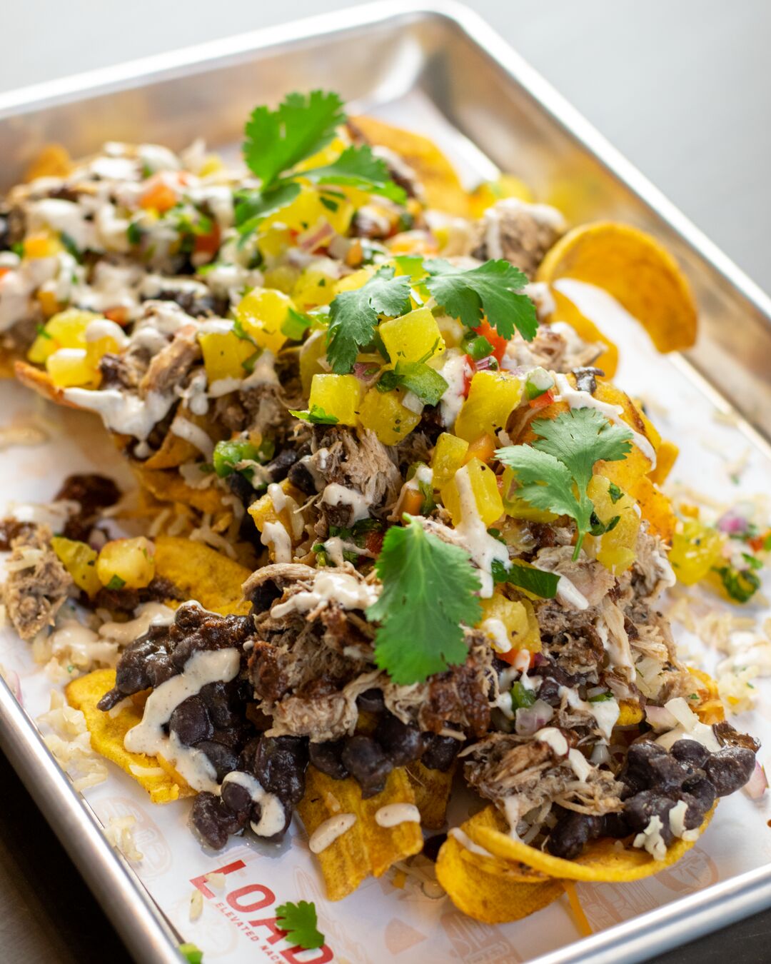Loaded: Elevated Nachos Jamaican Jerk nachos